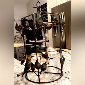 Black metal hanging bird and candle lantern